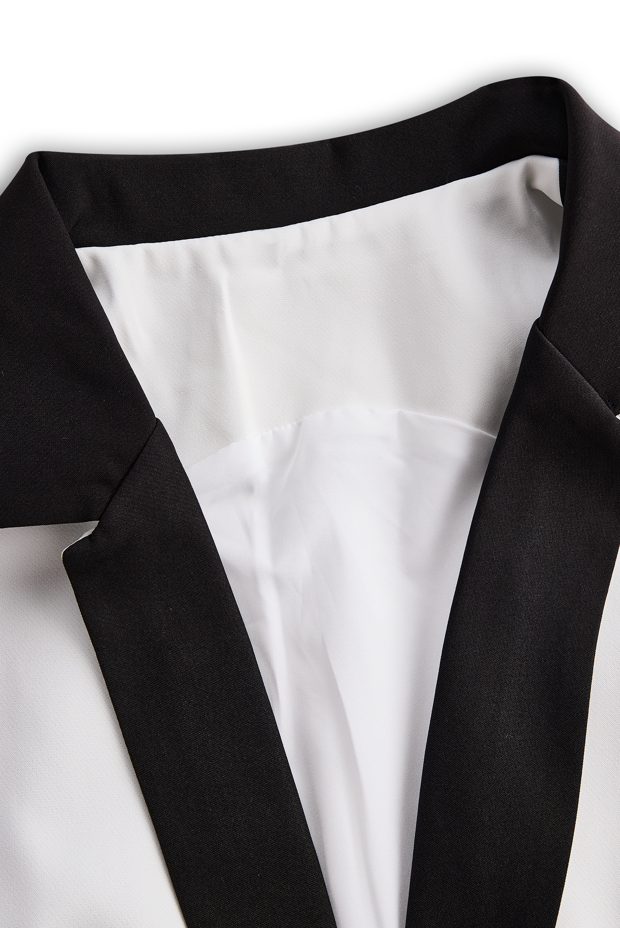 Elegante Tuta Bianca con Dettaglio Doppi Bottoni e Revers Nero